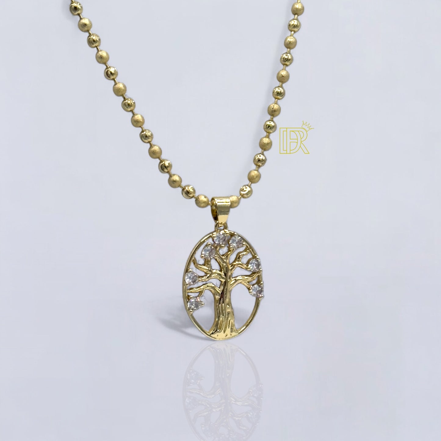 Cadena unisex  bañada en oro de 14k con colgante de árbol de la vida reforzado con un acabado premium y brillo duradero.