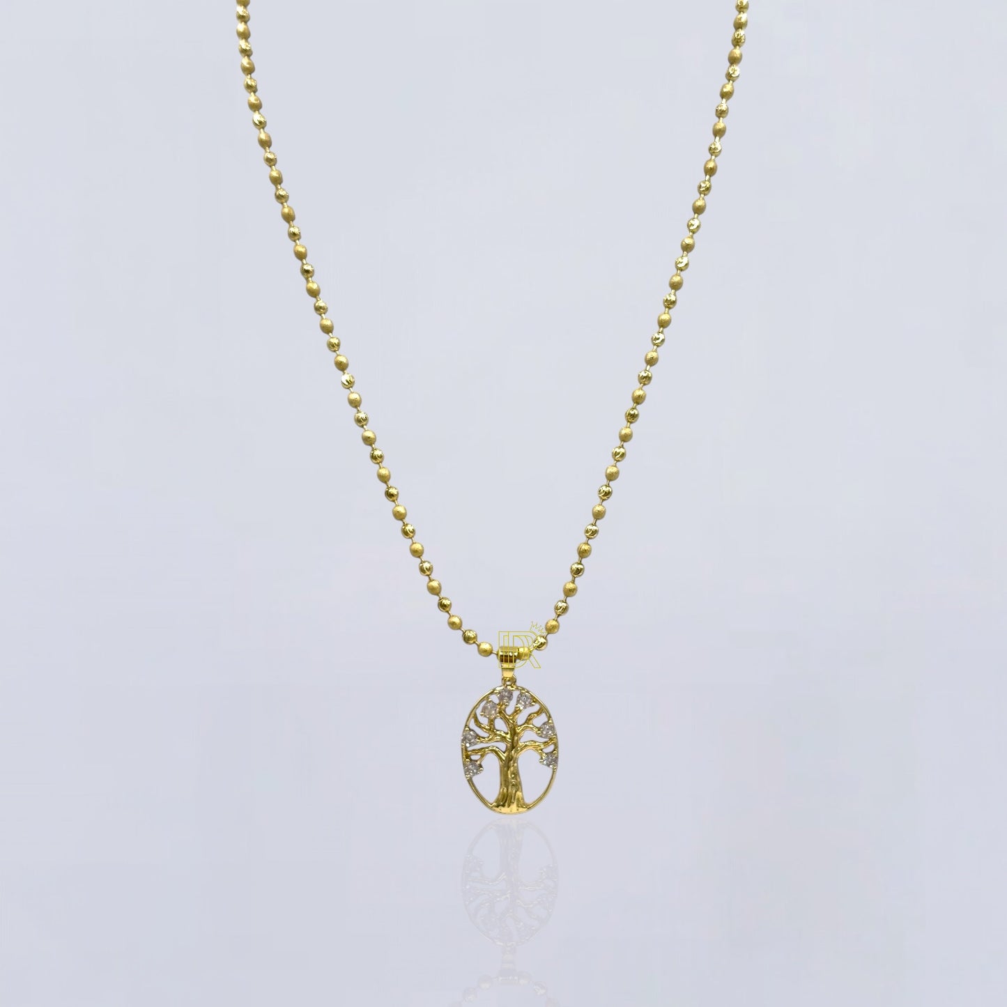 Cadena unisex  bañada en oro de 14k con colgante de árbol de la vida reforzado con un acabado premium y brillo duradero.